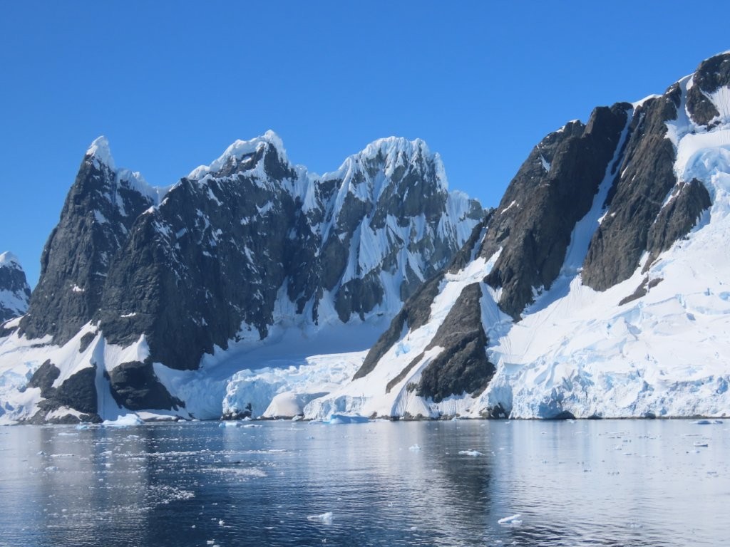 Rocky craggy cliffs covered in ice and snow