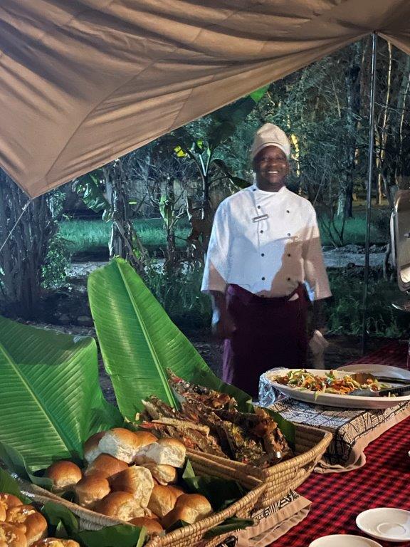 Chef ready to serve at the dining hall - he certainly knows What’s a Tanzania Safari really like?