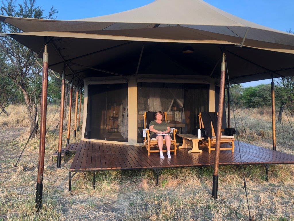 Kari relaxing on the deck of our tent