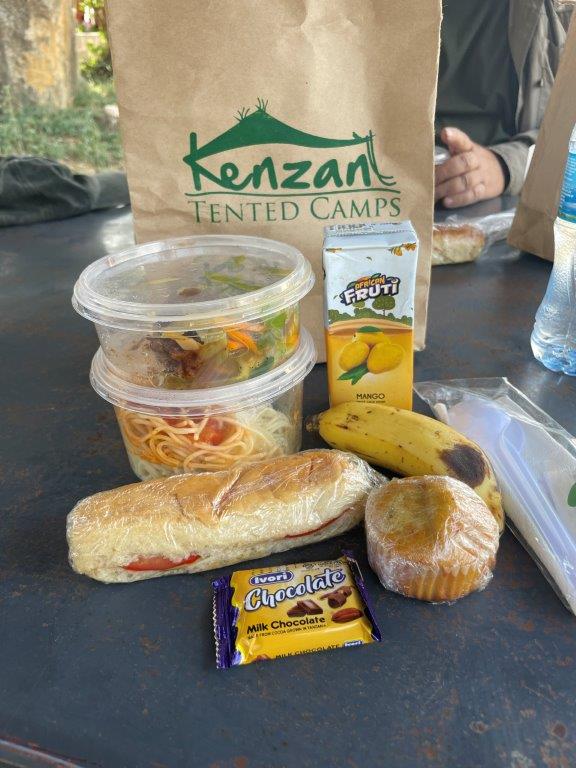 Another great bagged lunch from the Kenzan Tented Camp - banana, muffin, sandwich, juice box and pasta salad, plus a chocolate bar