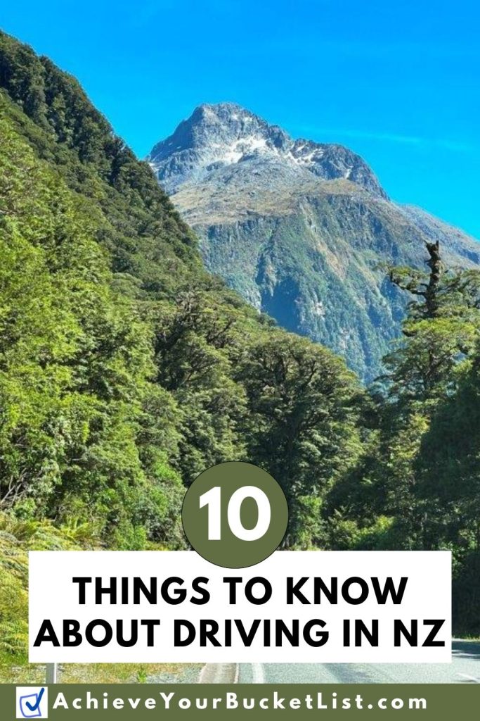 A Pinterest image showing a stunning mountain range covered in pine trees and a paved road leading towards them. The words on this image say "10 Things to Know About Driving in NZ" and I hope people will pin this blog post to Pinterest.