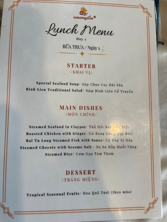 A printed lunch menu showing Starters, Main Dishes and Dessert.