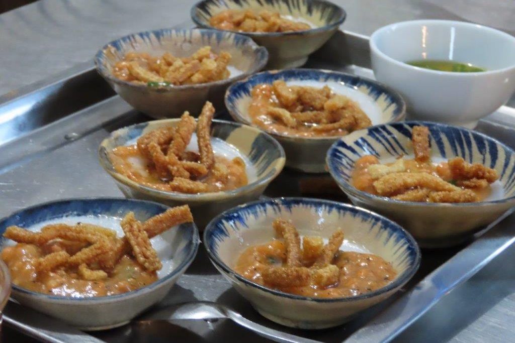 Small bowls of Bahn Beo, a popular street food in Vietnam.
