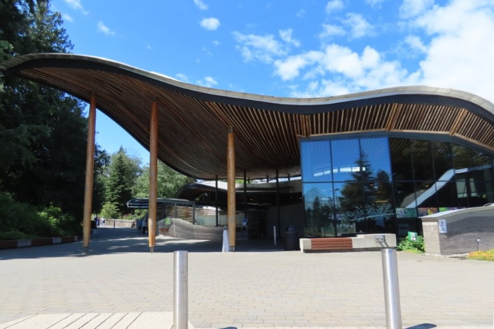 An angled shaped roof line and lots of glass creates a welcoming environment at the VanDusen Botanical Garden in Vancouver, BC