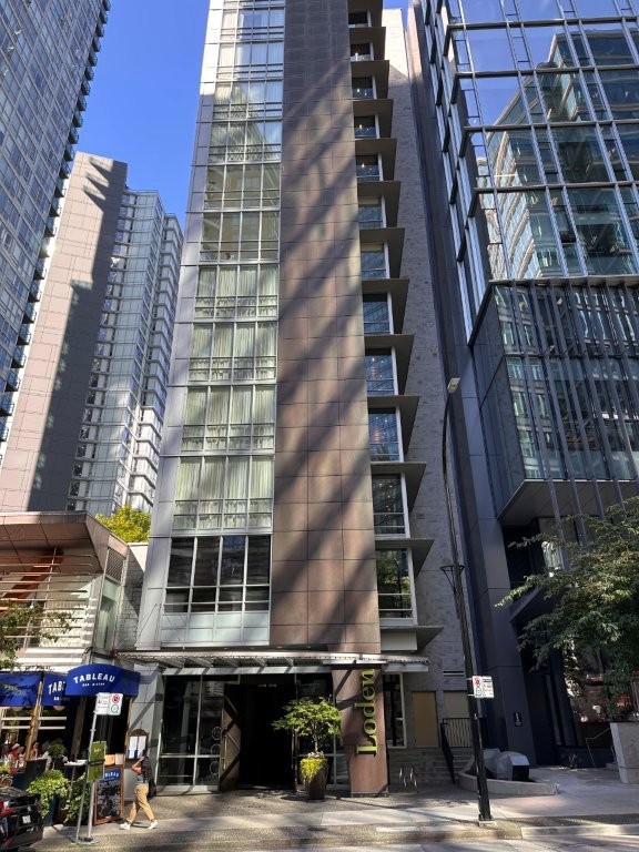 Street view of Loden Vancouver, a boutique mid-range hotel in Coal Harbour known for quiet luxury and personal service