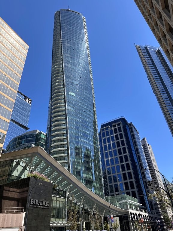 Exterior of Paradox Hotel Vancouver, a modern high-rise hotel offering upscale mid-range stays in the financial district