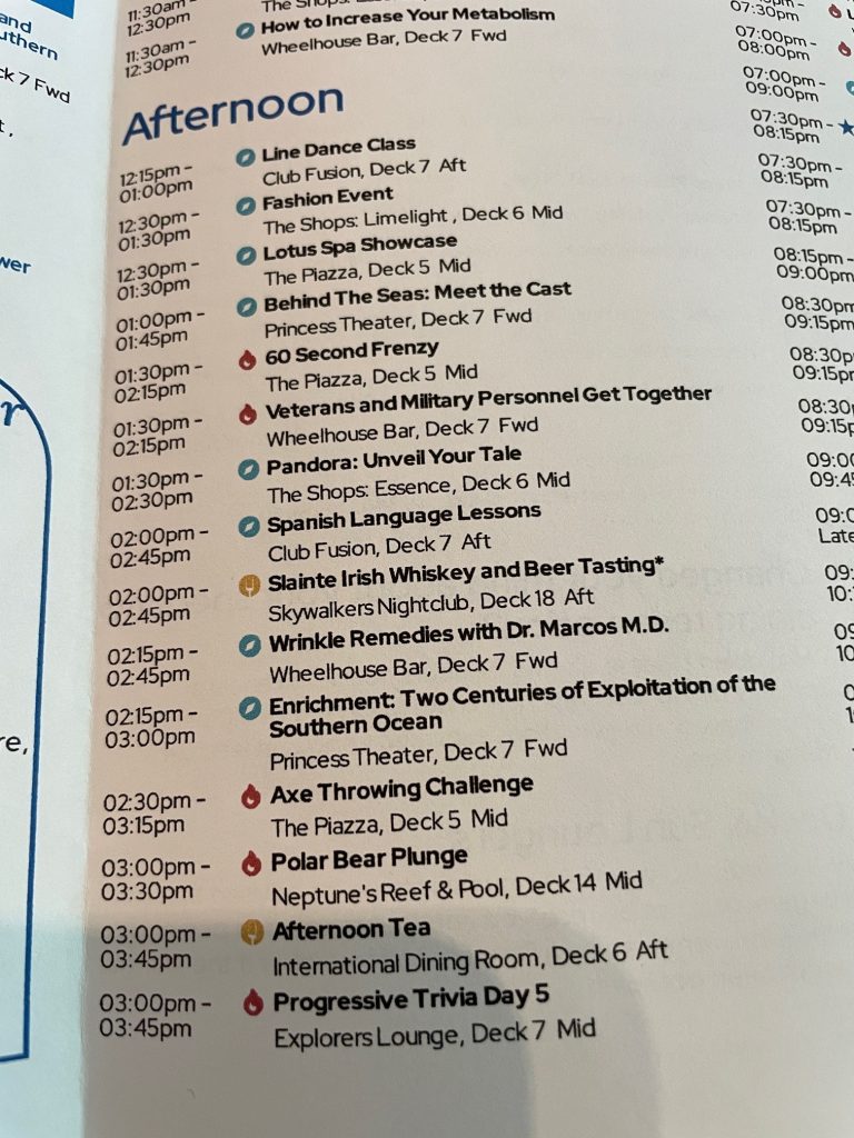 The afternoon schedule includes trivia, games, demonstrations, enrichment talks, and live entertainment. There were plenty of options without feeling like we had to do everything.