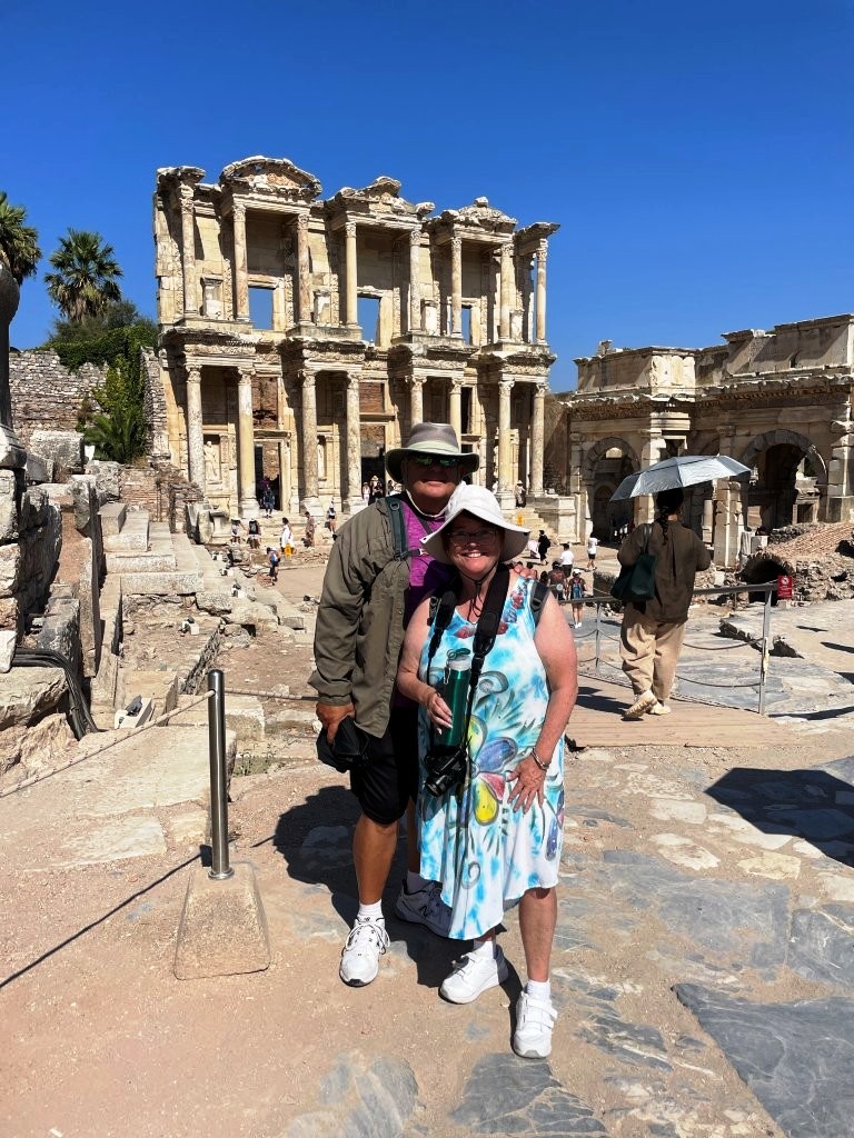 Kari and Bill stand together before the towering stone façade of the Library of Celsus at ancient Ephesus. Our independently booked Ephesus excursion became one of the biggest highlights of the cruise.