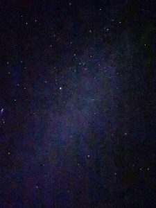 A wash of light across the dark skies, with little lights twinkeling. Stargazing at Lake Tekapo is a sight to behold.