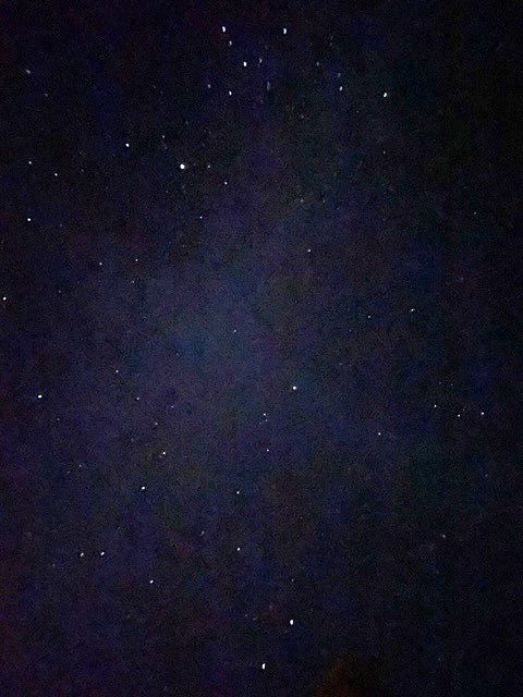 Dark sky with millions of dots, representing the stars.